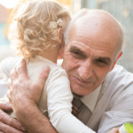 Grandfather holding child