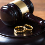 wedding-bands-on-a-gavel-platform