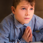 Little boy praying